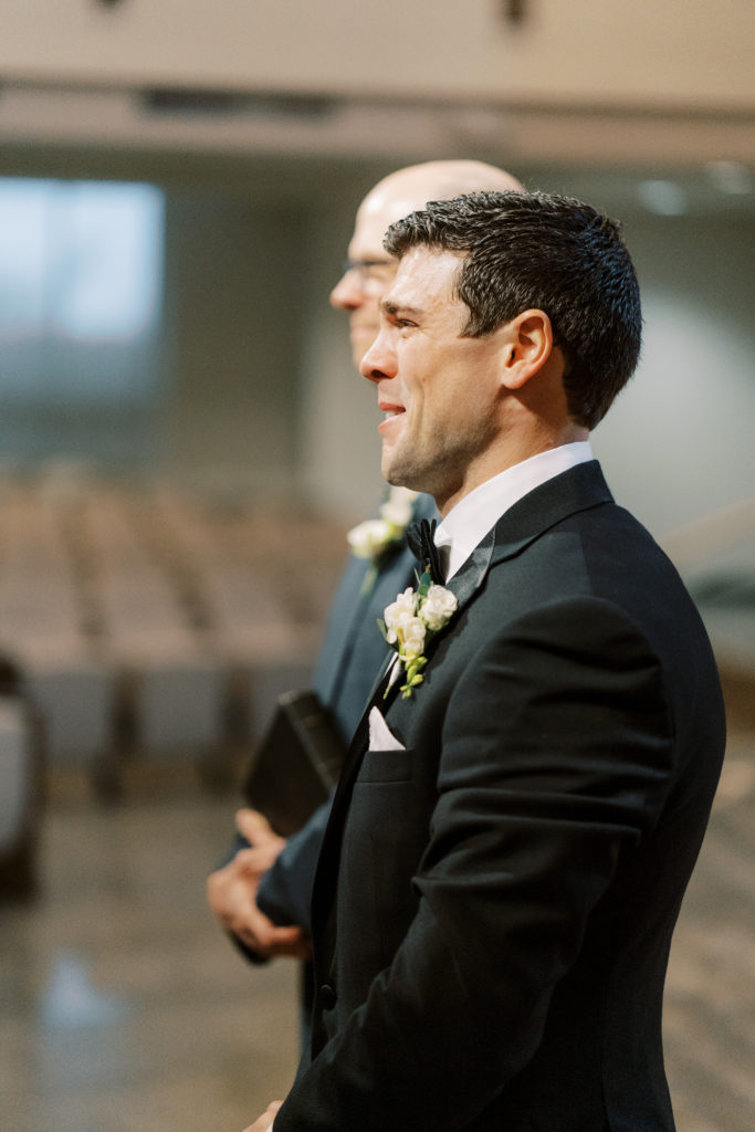 groom crying when he sees bride