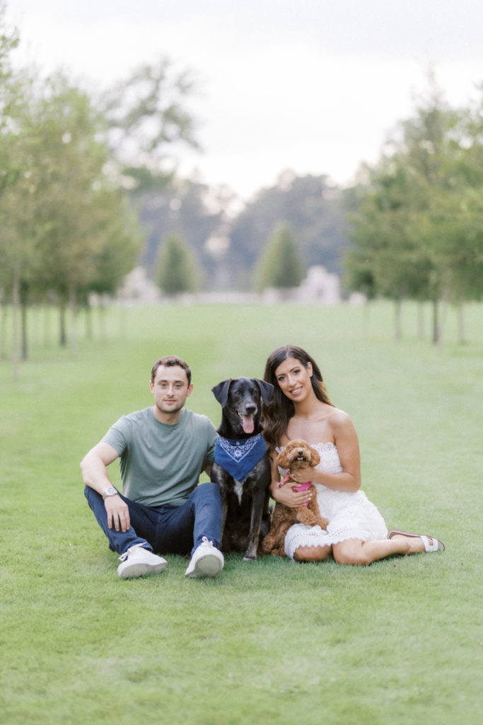 family couple with dogs